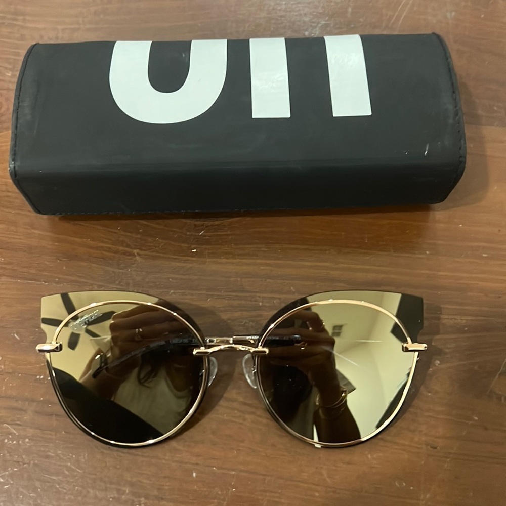 Unofficial sunglasses new without tags